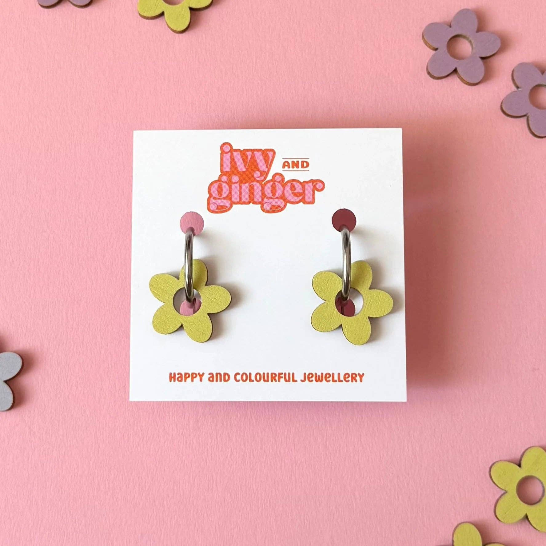 A pair of Ivy and Ginger pistachio flower shaped hoop earring