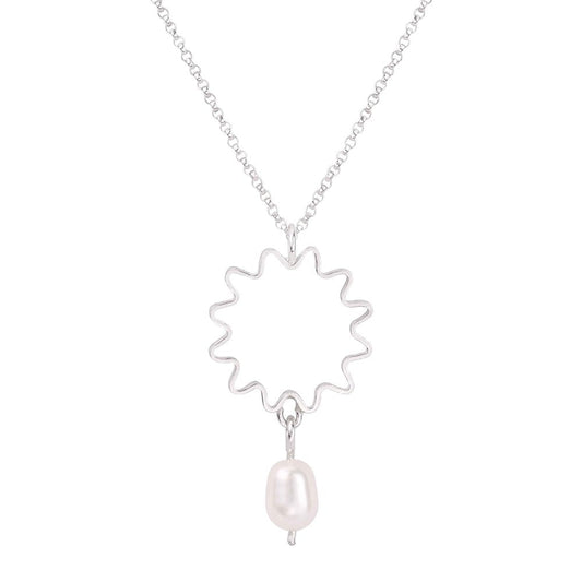Mini Ondulée pearl pendant necklace with small delicate drop pearl, matching studs, and hoops for versatile styling.