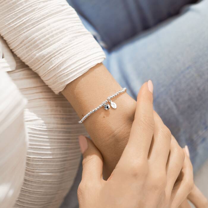 A LITTLE 'PAW PRINT' SILVER BRACELET