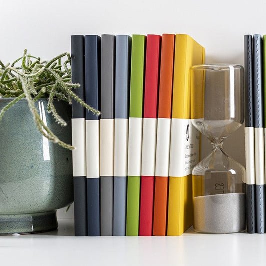 A5 recycled leather notebook with Make a Mark debossed cover, elastic closure, and sustainable lined pages