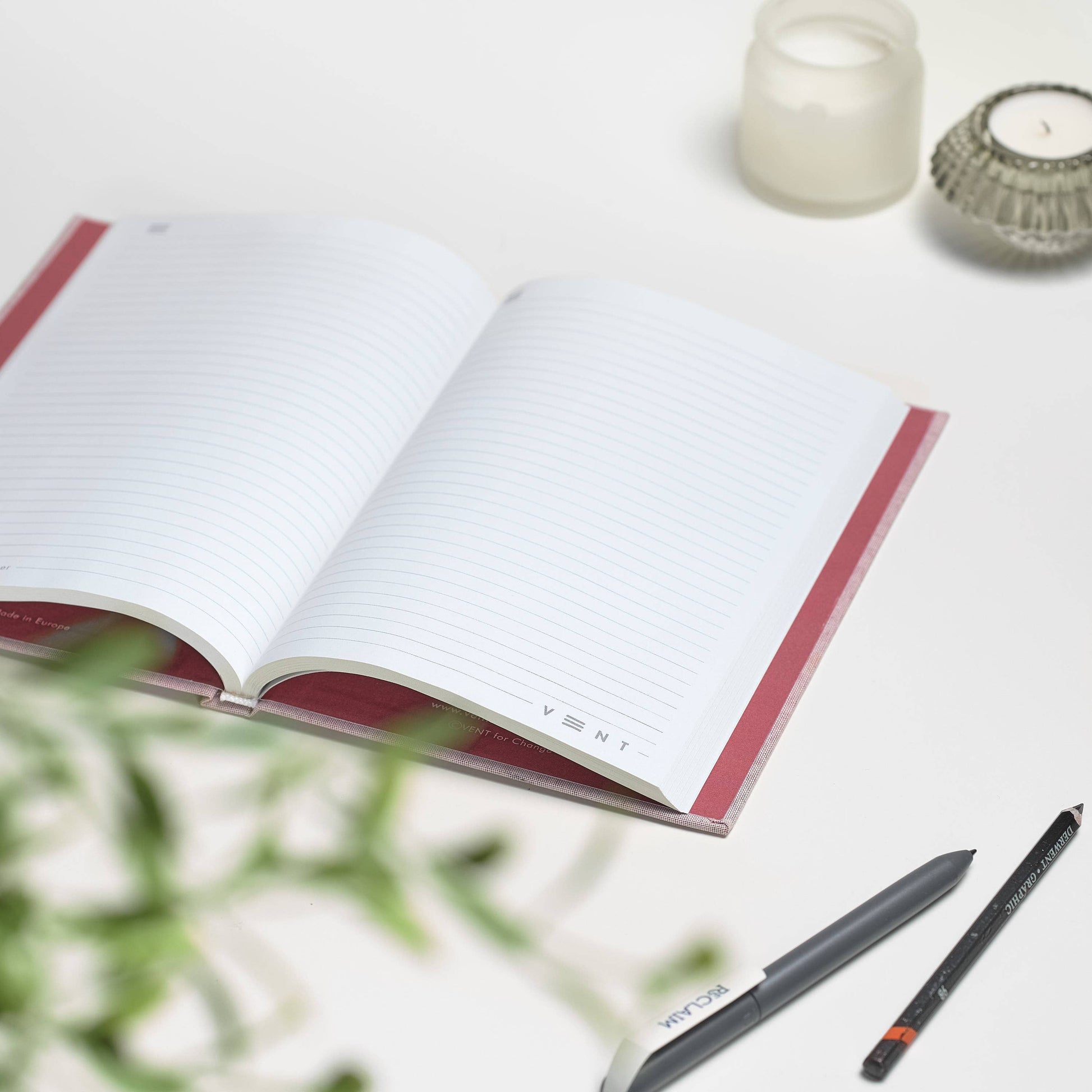 A5 notebook with hardback cover made from recycled ocean plastic and 200 pages of recycled lined paper - Coral Pink