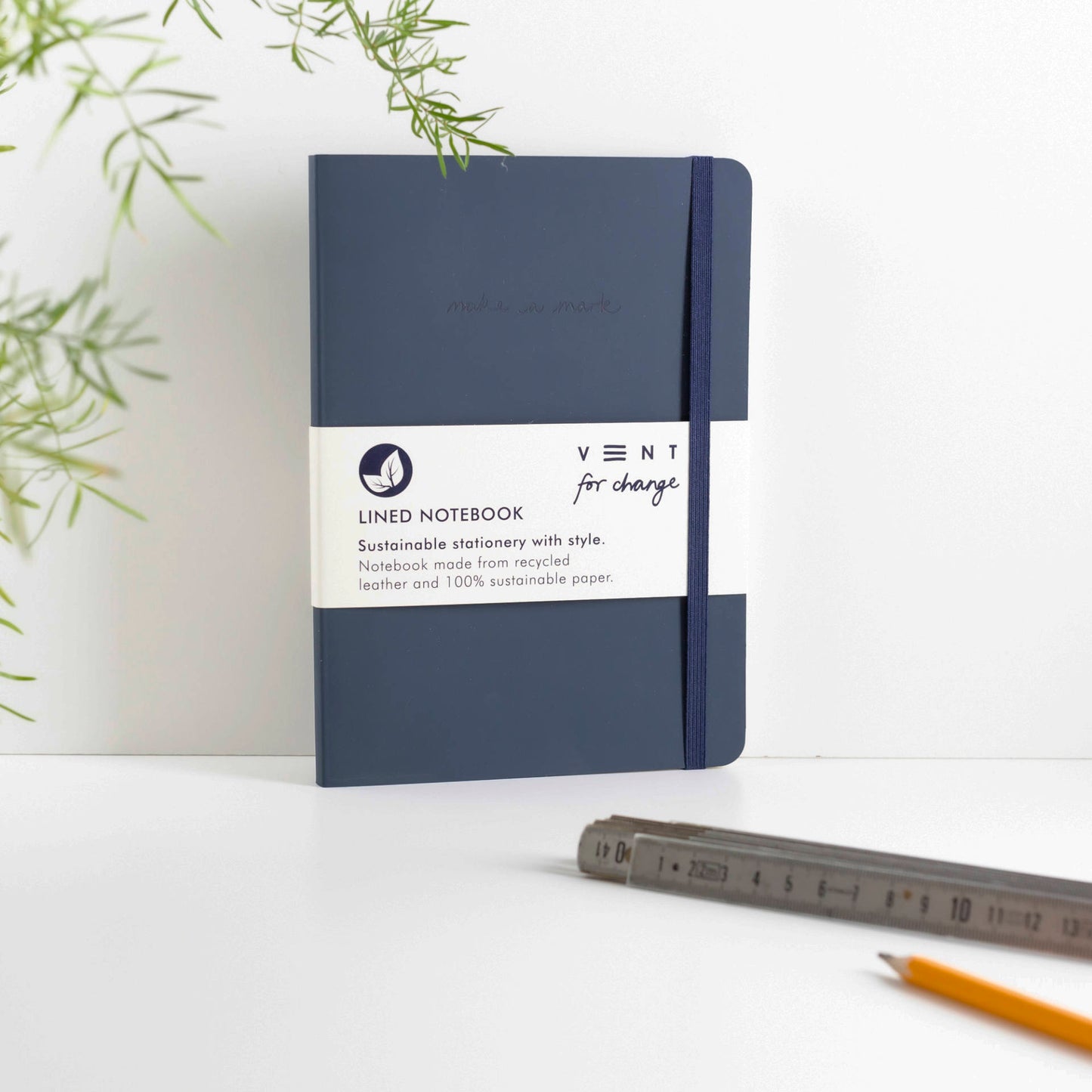 A5 recycled leather notebook with Make a Mark debossed cover, elastic closure, and sustainable lined pages - navy