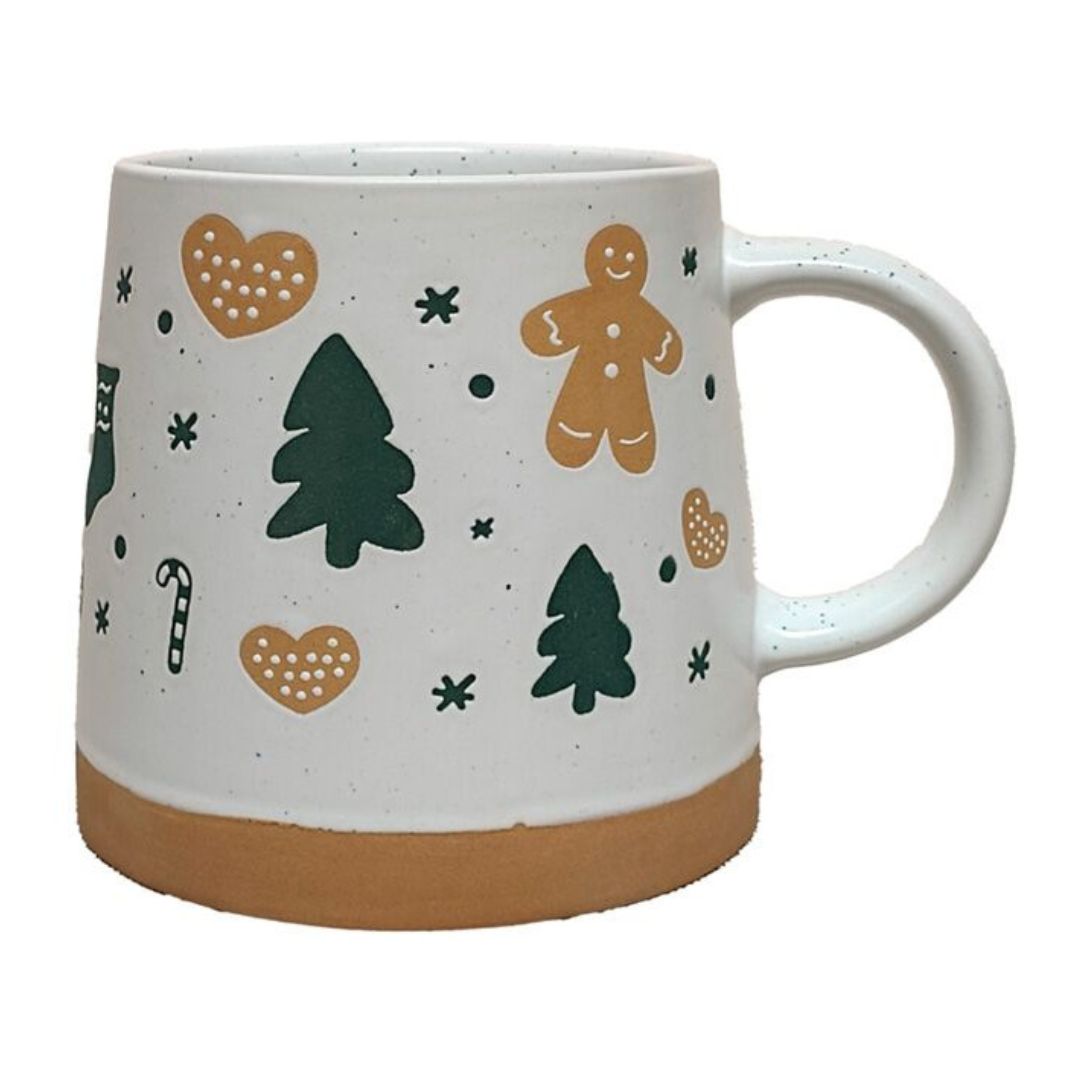 A stoneware Christmas mug with a tapered design and a Christmas tree and Gingerbread Man illustration