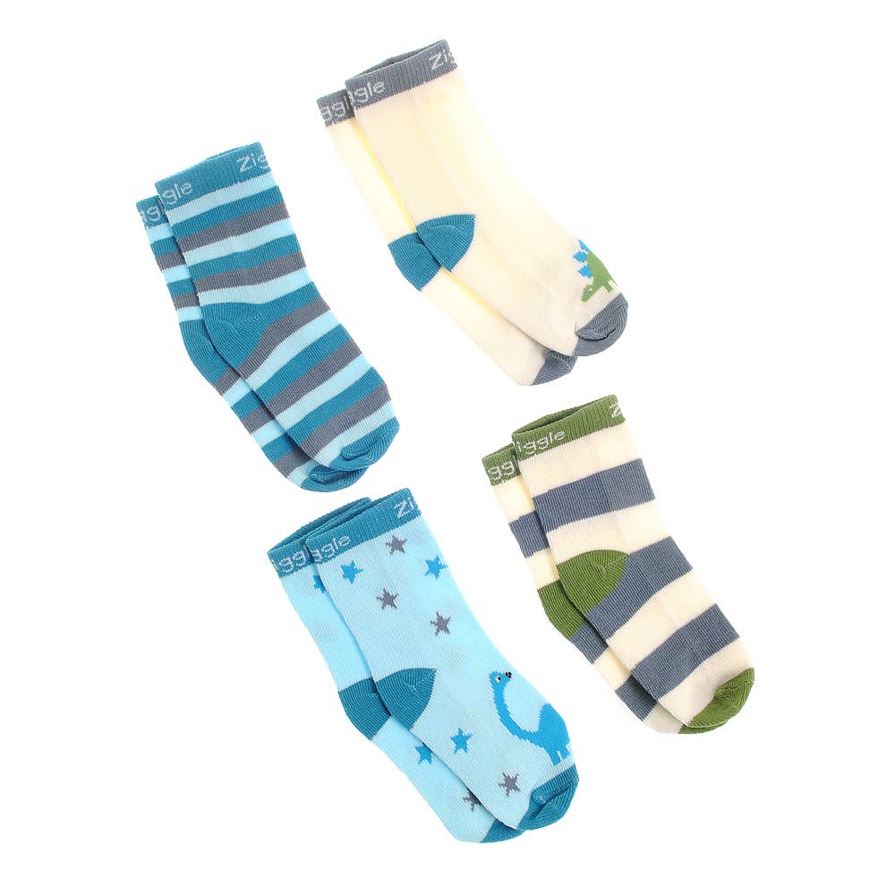 Set of four cotton baby socks with different dinosaur designs, anti-slip soles and ribbed cuffs