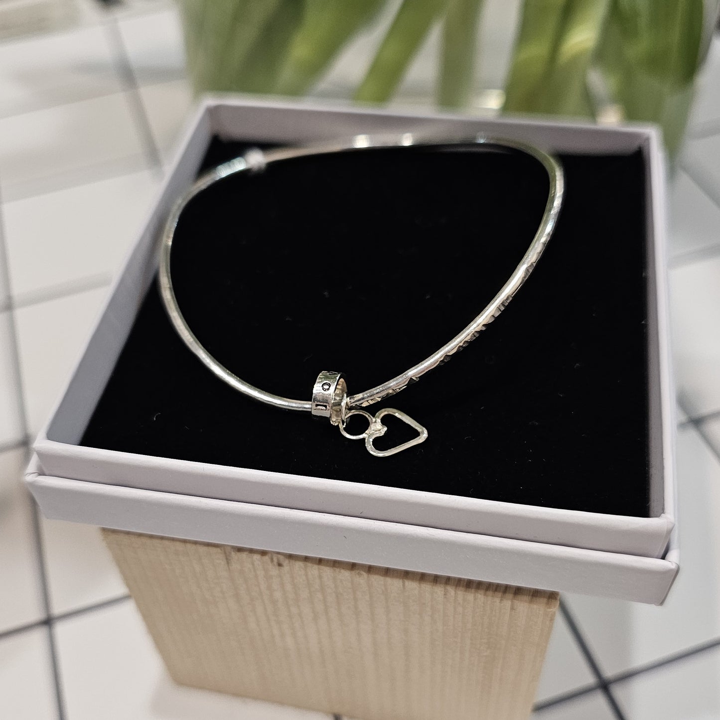 CURVED WIRE HEART TAG BANGLE