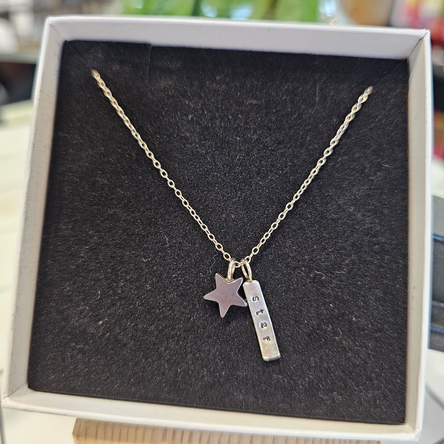 HEMATITE STAR TAG NECKLACE