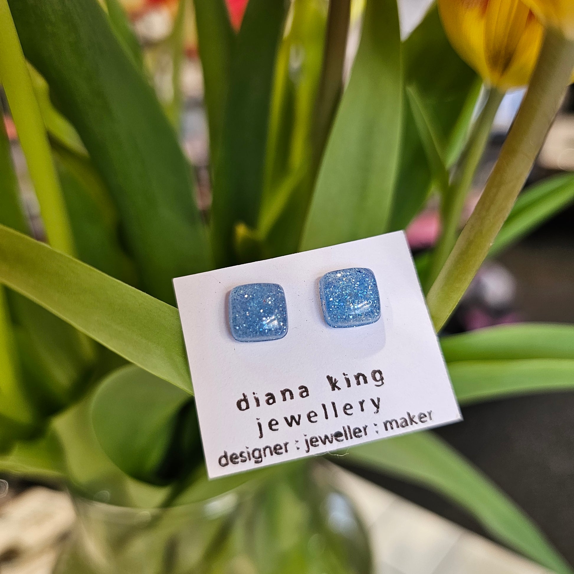 Blue resin sparkle square stud earrings handmade by Diana King Jewellery in Perthshire