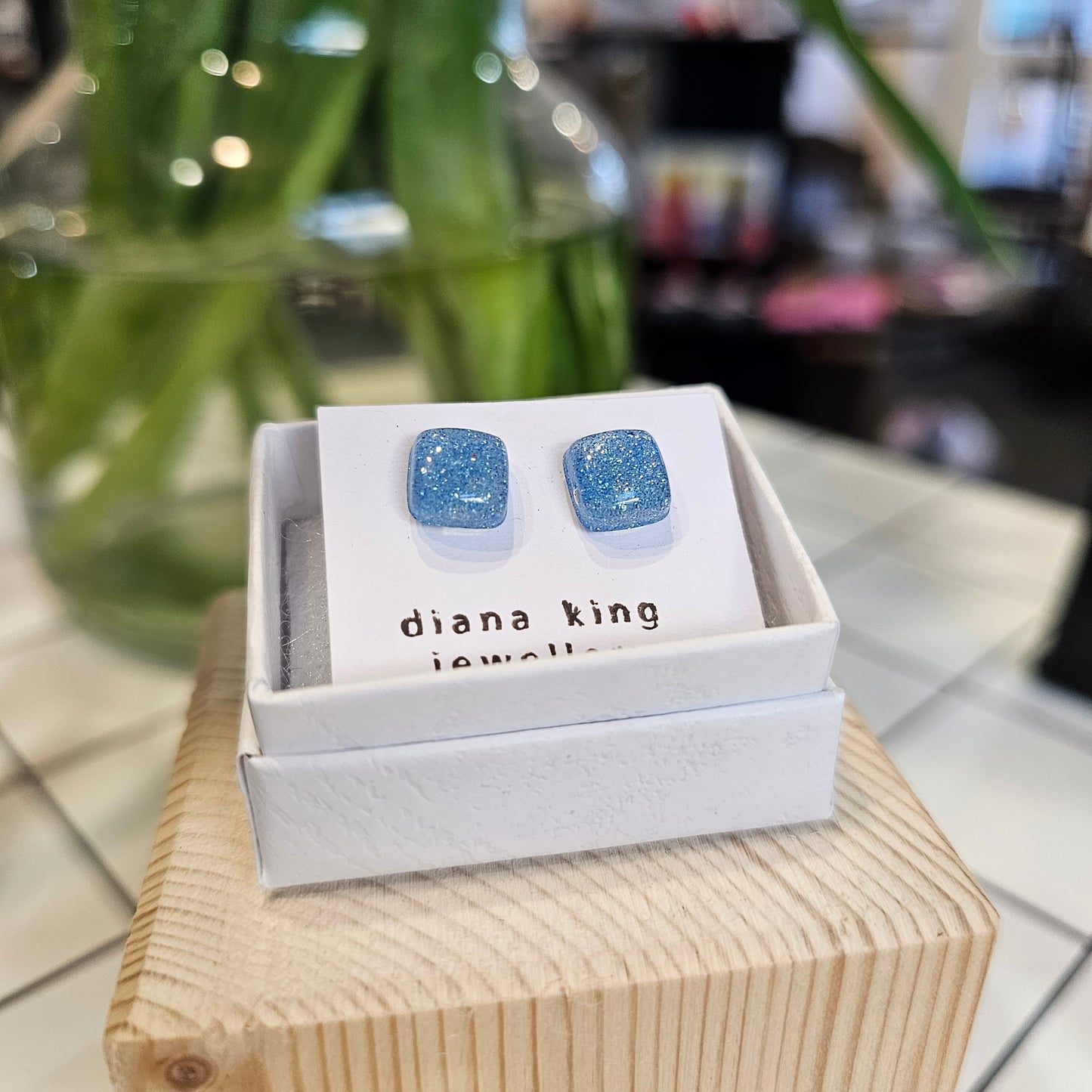 Blue resin sparkle square stud earrings handmade by Diana King Jewellery in Perthshire