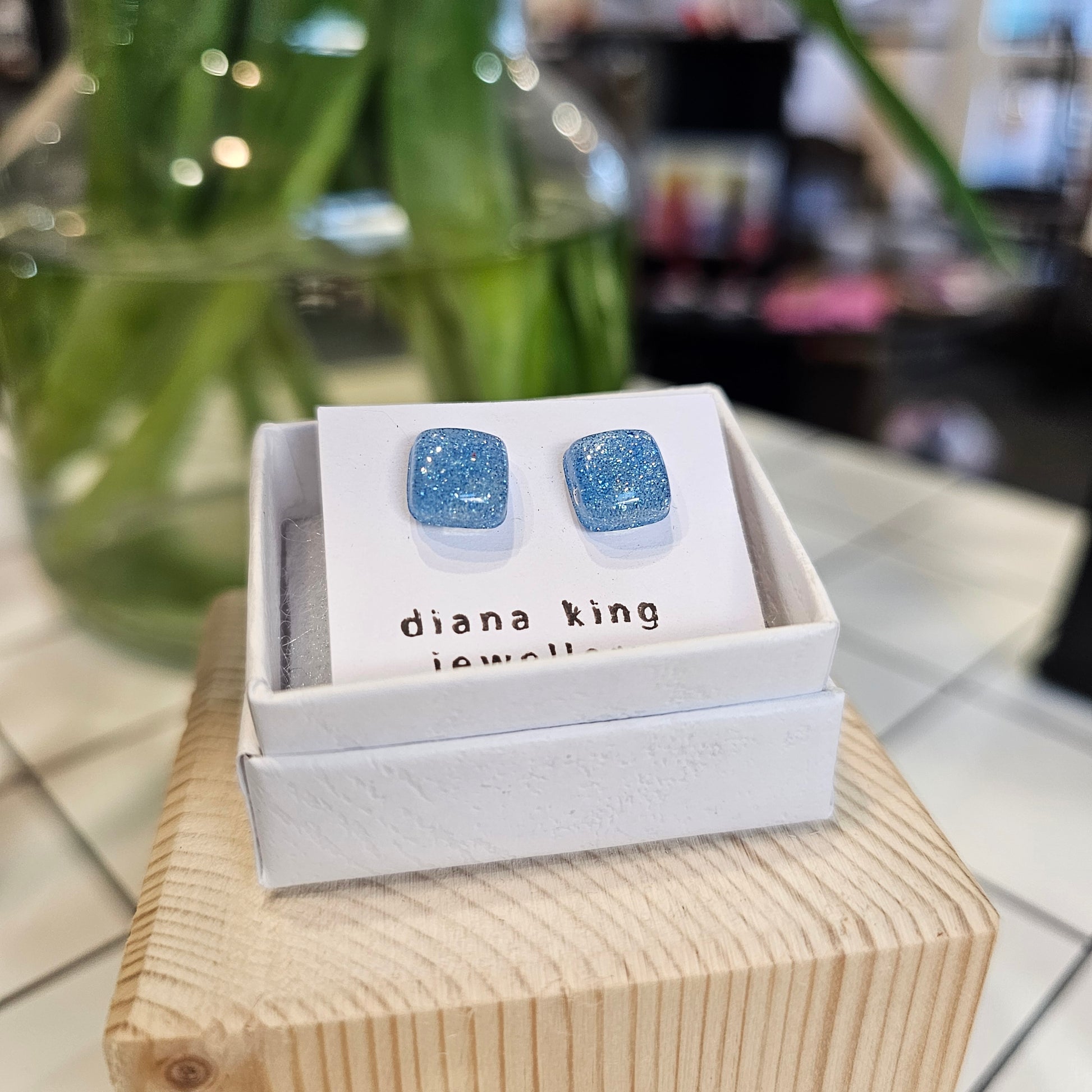 Blue resin sparkle square stud earrings handmade by Diana King Jewellery in Perthshire