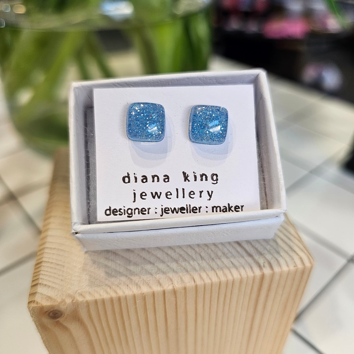 Blue resin sparkle square stud earrings handmade by Diana King Jewellery in Perthshire