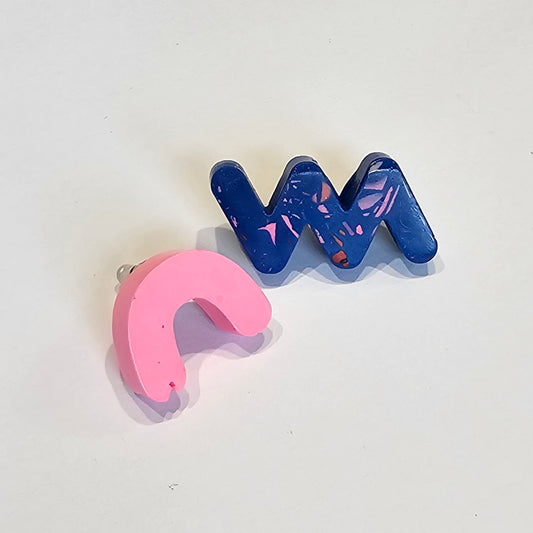 MIS-MATCHED STUDS PAIR