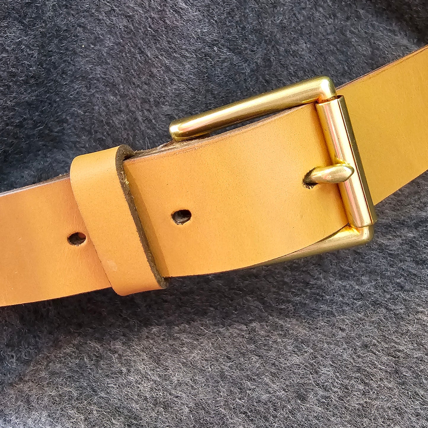 Handcrafted Sedgwick vegetable-tanned leather belt with brass buckle in branded drawstring bag