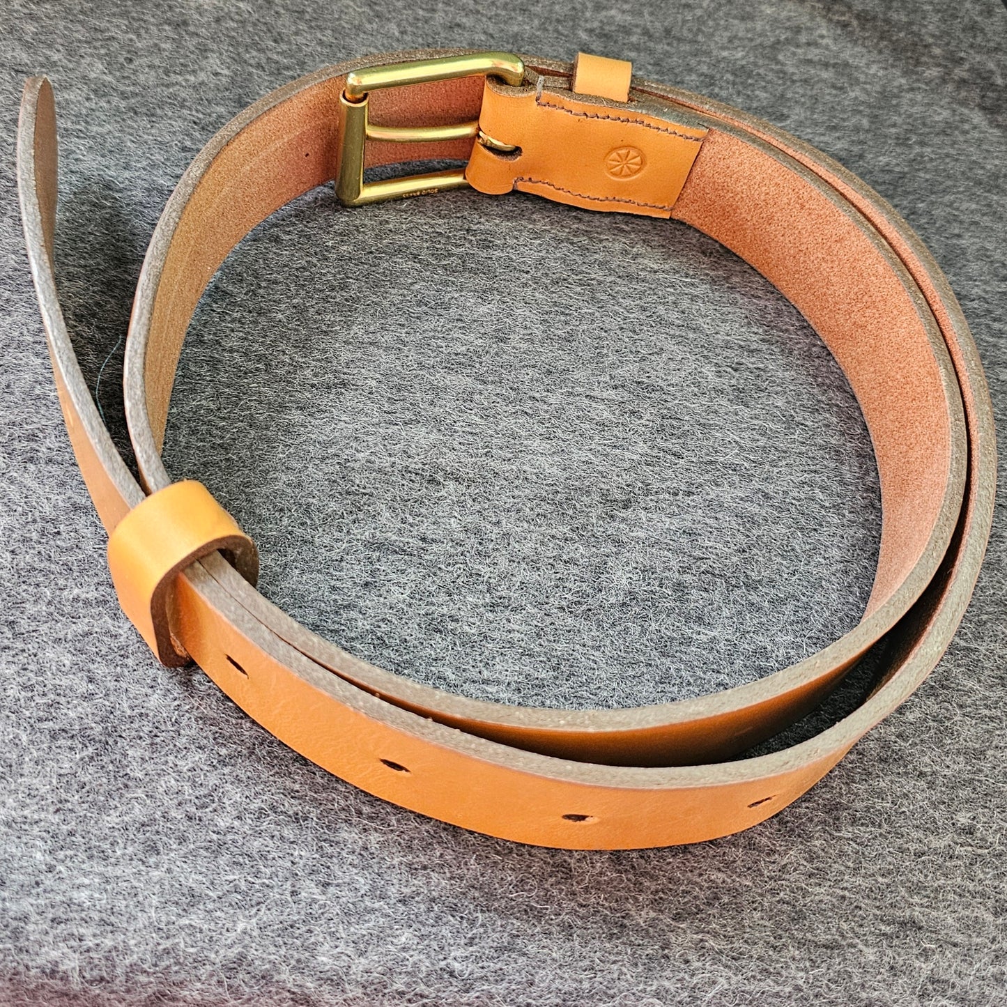 Handcrafted Sedgwick vegetable-tanned leather belt with brass buckle in branded drawstring bag