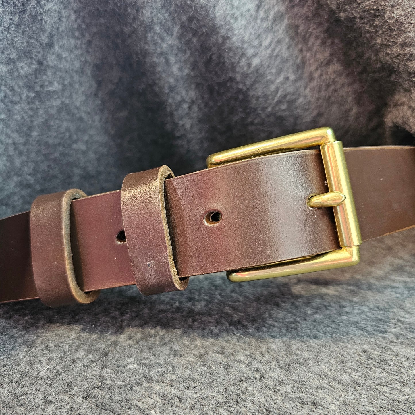 Handcrafted Sedgwick vegetable-tanned leather belt with brass buckle in branded drawstring bag