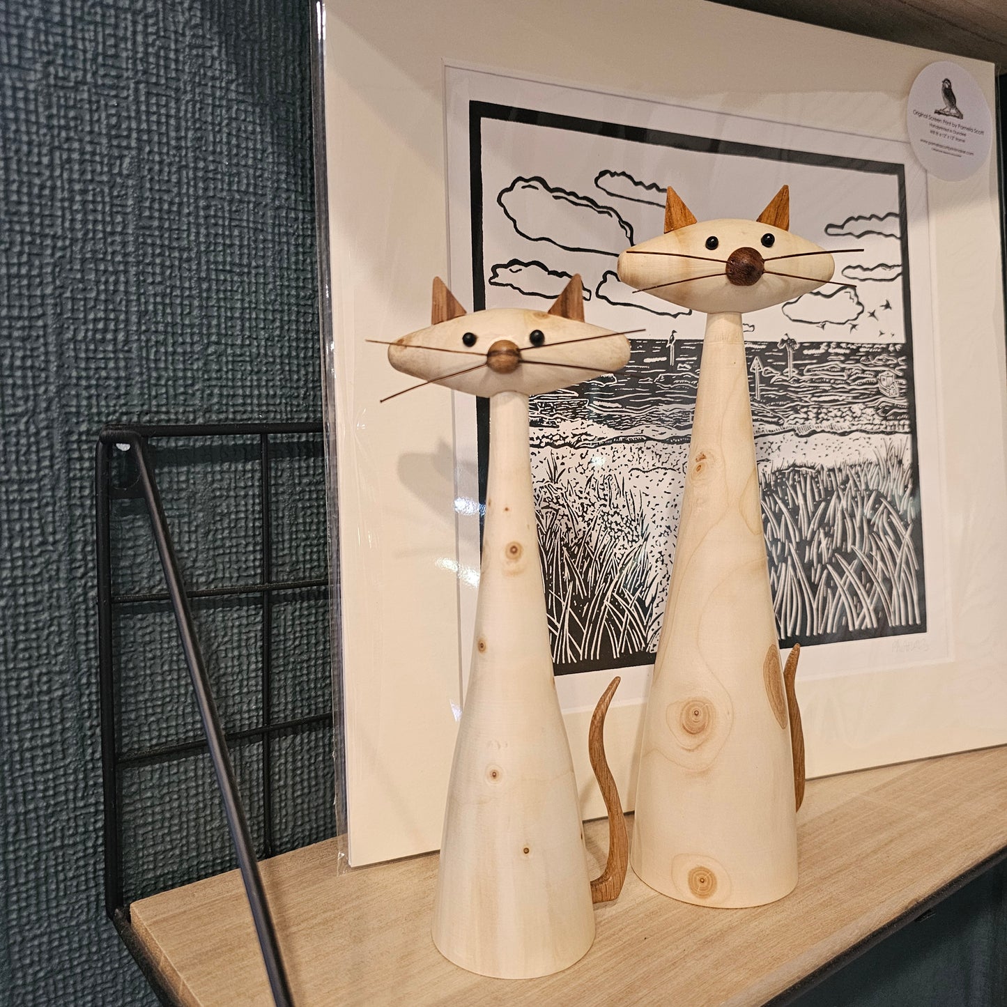 Handmade tall wooden cat figures in small and large, crafted from reclaimed Christmas trees