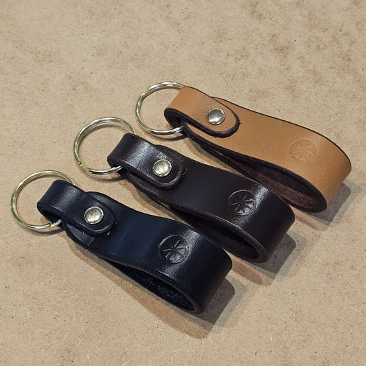 Three Handcrafted Sedgwick vegetable-tanned leather keyrings with solid brass hardware