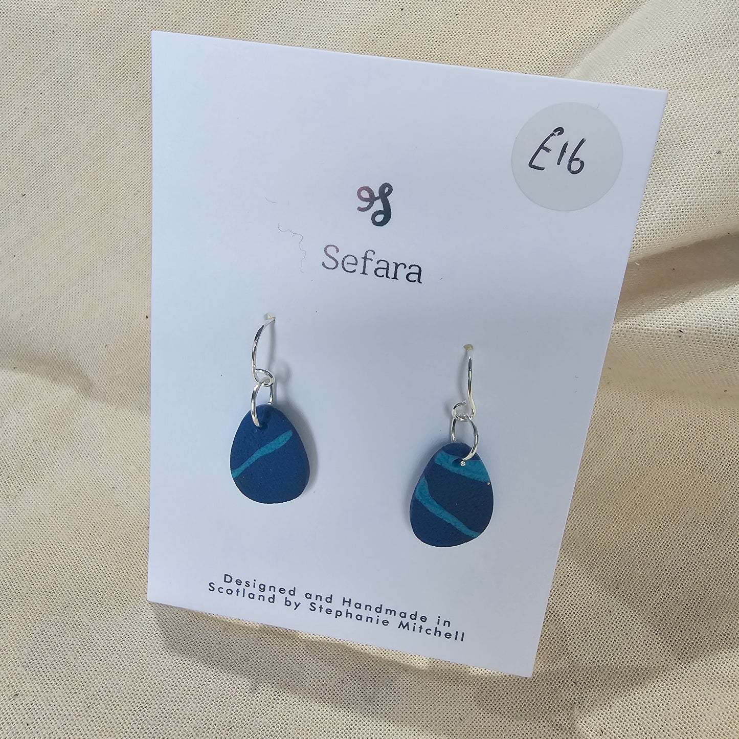 Pair of handmade polymer clay hook earrings – lightweight blue striped design by Sefara Jewellery