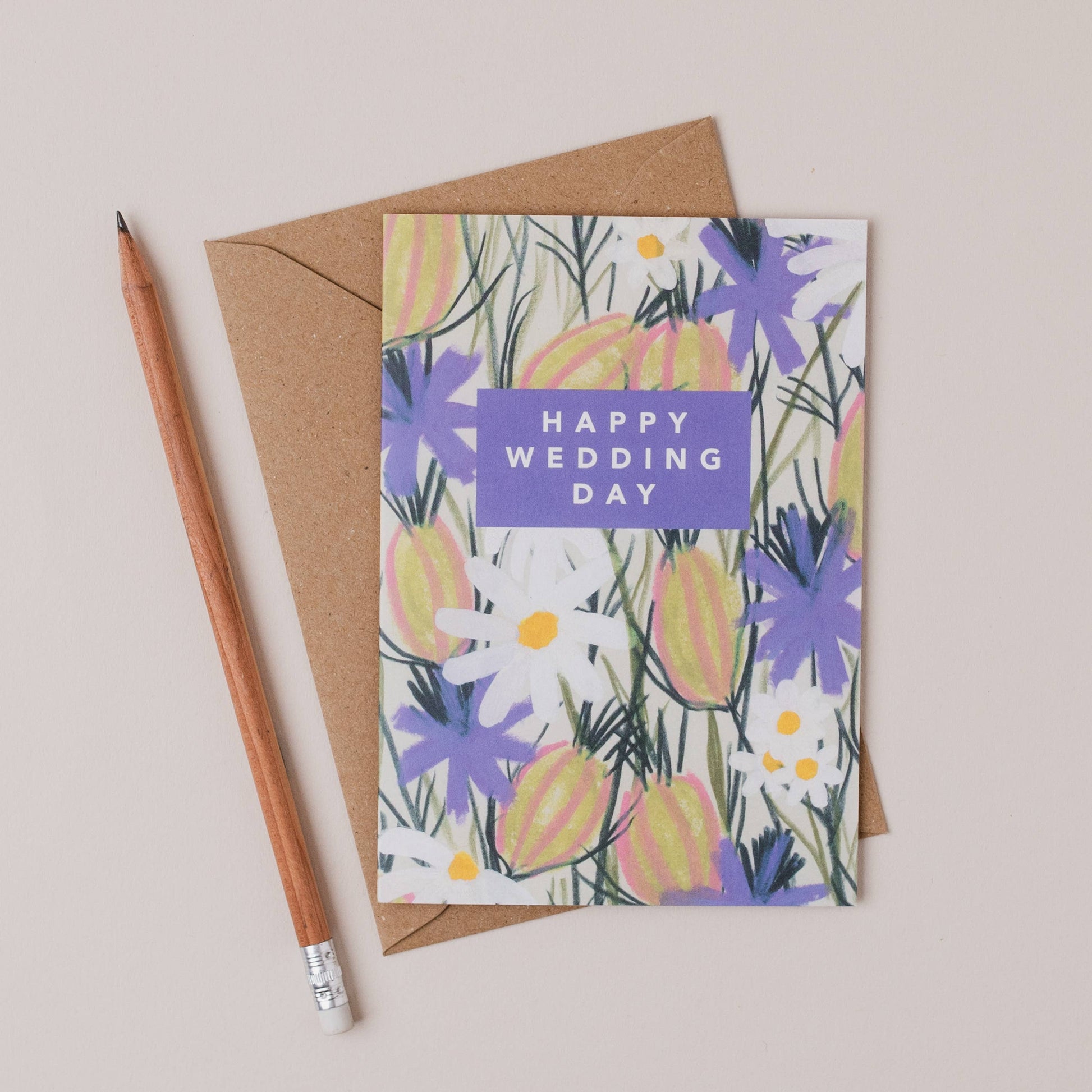 Luxury A6 greetings card with 'happy wedding day' text and purple flowers and white daisies illustration, blank inside, printed on 350gsm UK card