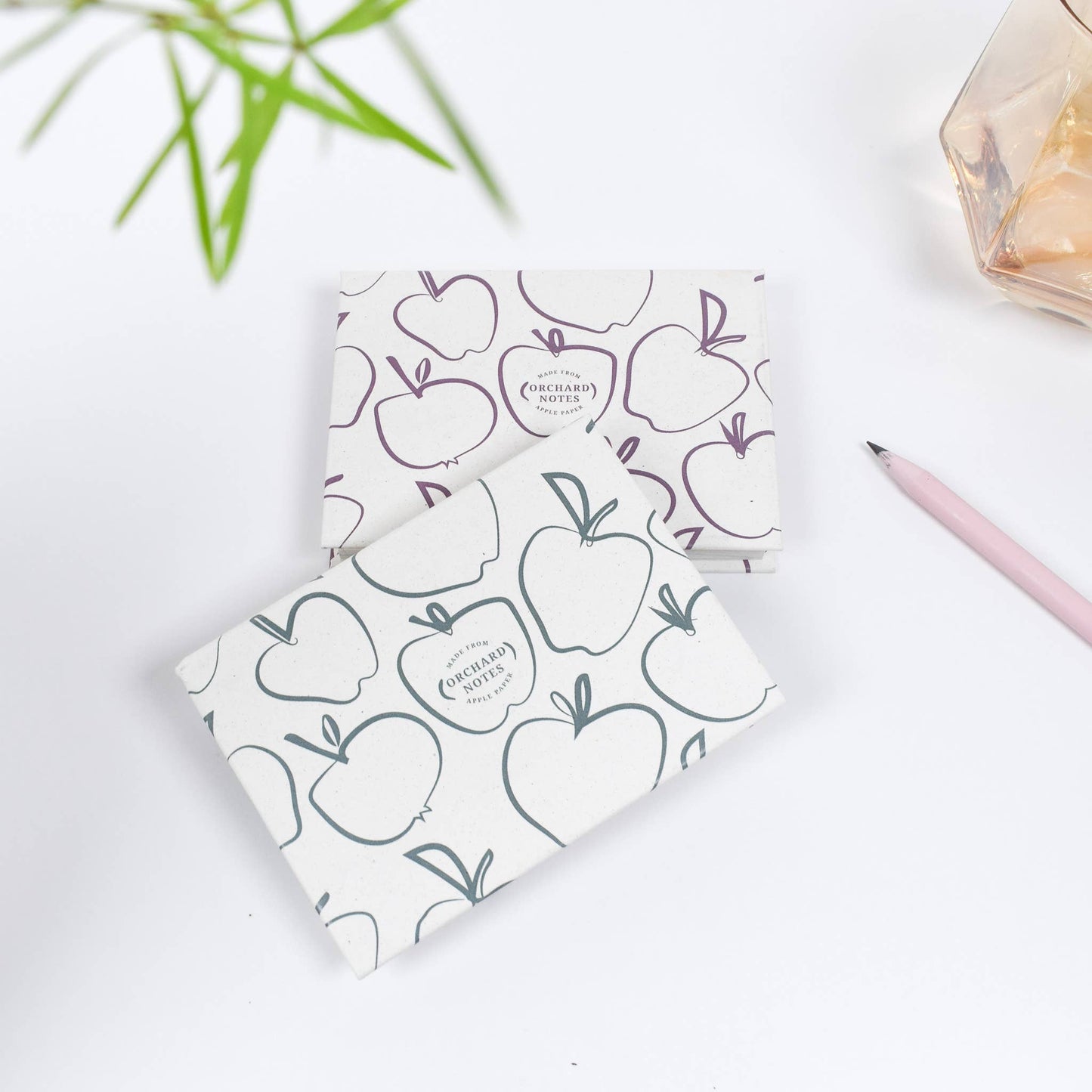 Recycled sticky notes pad in green or pink with Orchard Notes debossed cover and three sizes of biodegradable sticky notes