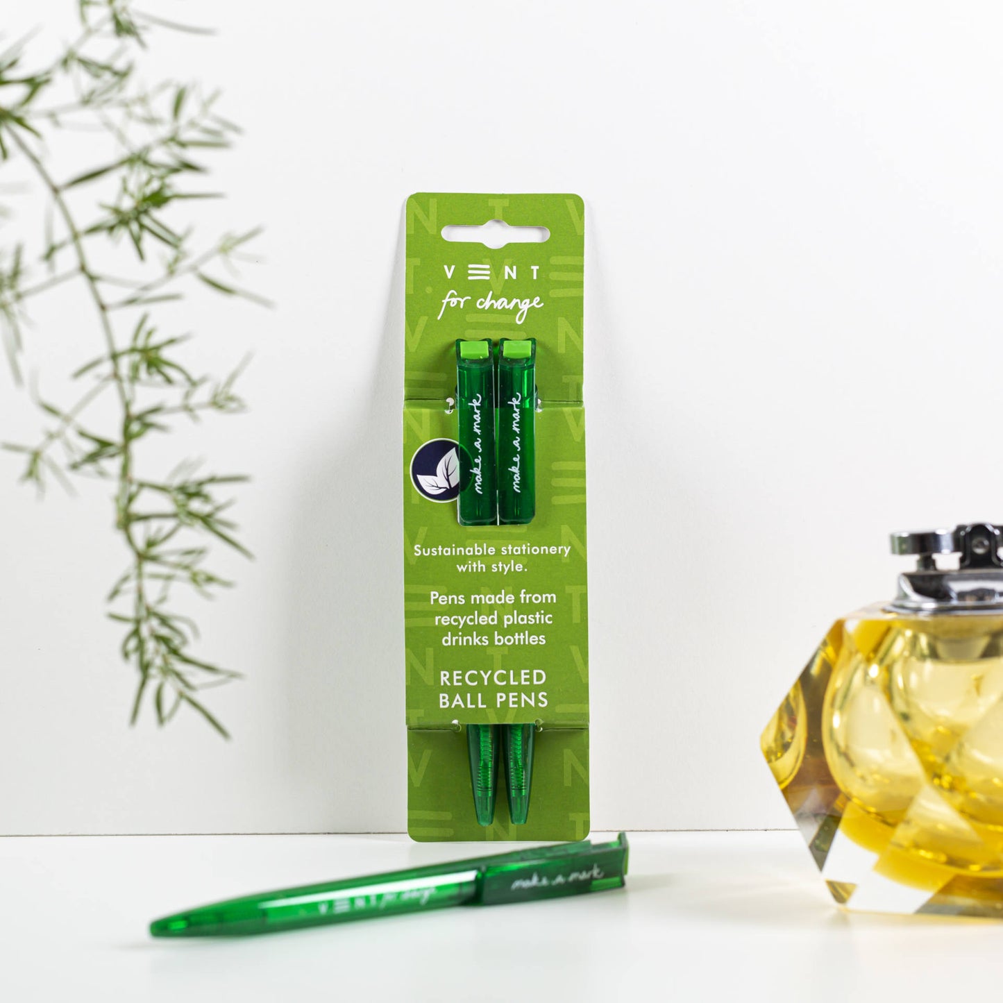 2 recycled ballpoint pens with black ink in a green Make a Mark sleeve, made from single-use plastic bottles