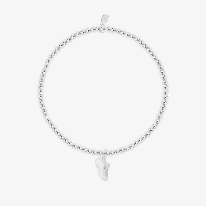 A silver plated stretch beaded bracelet with a running shoe charm