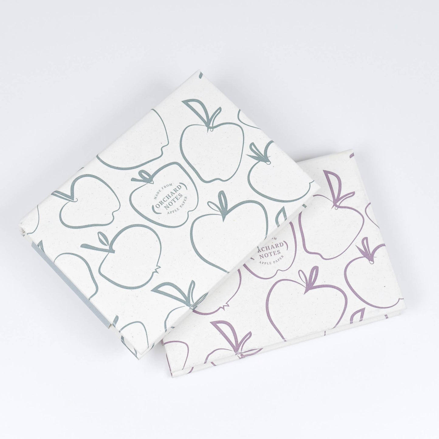 Recycled sticky notes pad in green or pink with Orchard Notes debossed cover and three sizes of biodegradable sticky notes