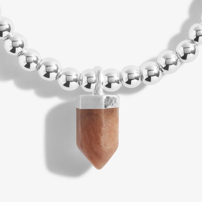 'Empowerment’ bracelet with affirmation sunstone charm. Silver-plated, stretch fit, and gift boxed
