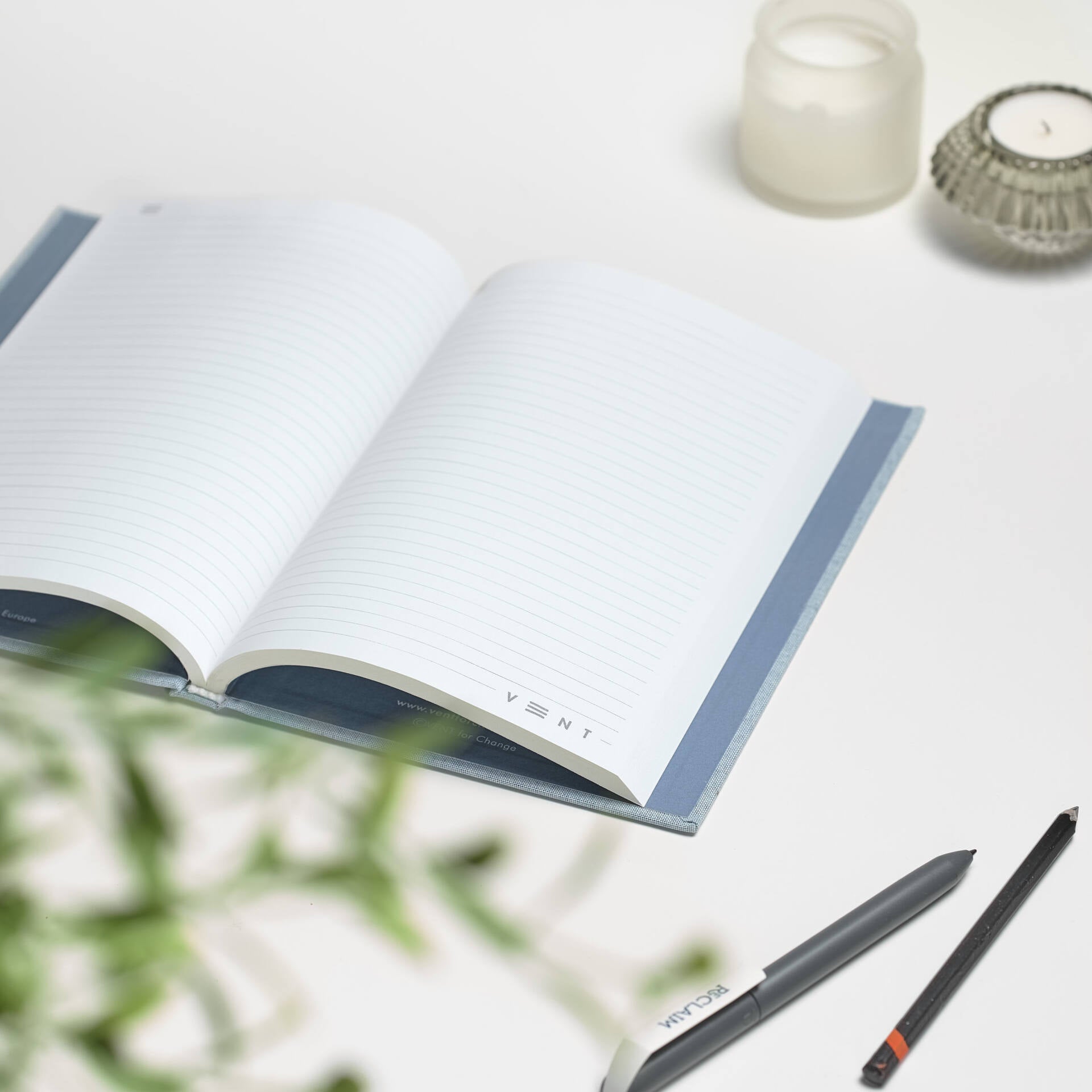 A5 notebook with hardback cover made from recycled ocean plastic and 200 pages of recycled lined paper - Sea Blue