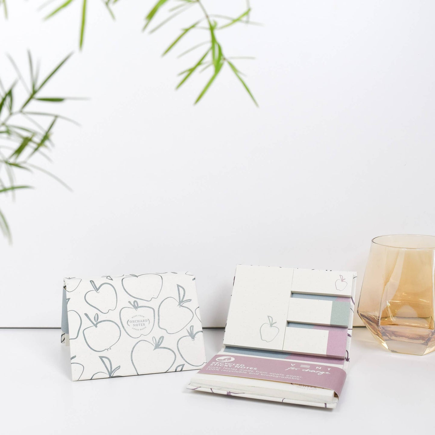 Recycled sticky notes pad in green or pink with Orchard Notes debossed cover and three sizes of biodegradable sticky notes