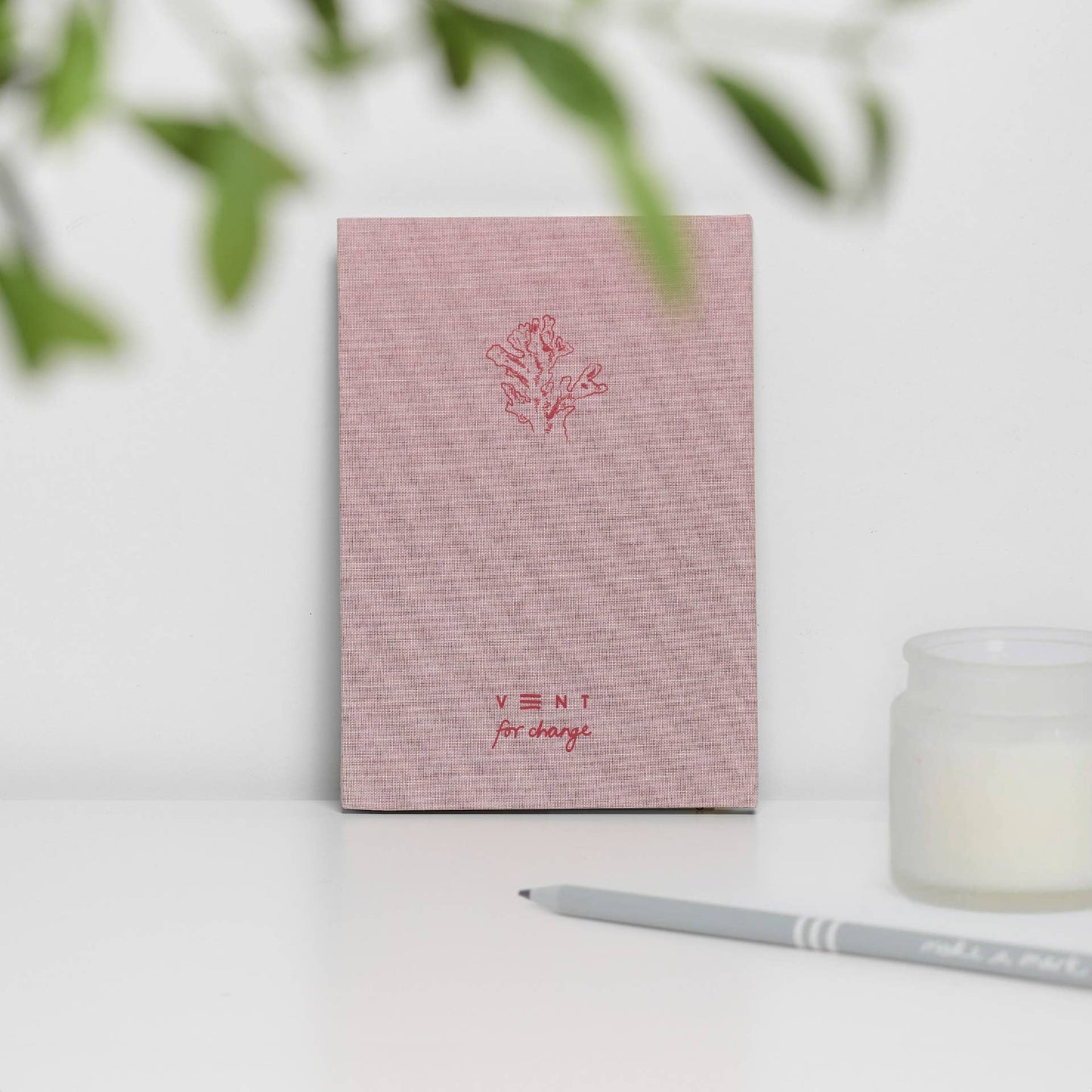 A5 notebook with hardback cover made from recycled ocean plastic and 200 pages of recycled lined paper - Coral Pink