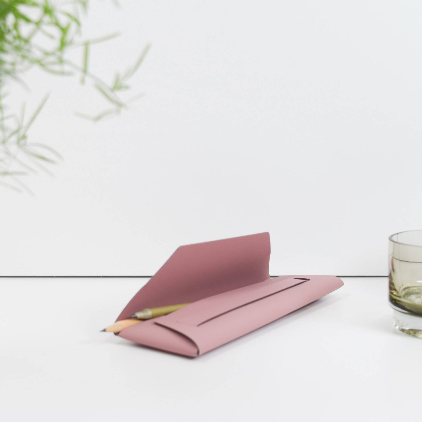 Handmade recycled leather pencil pouch debossed with EDIT design, in soft pink, perfect for stationery lovers