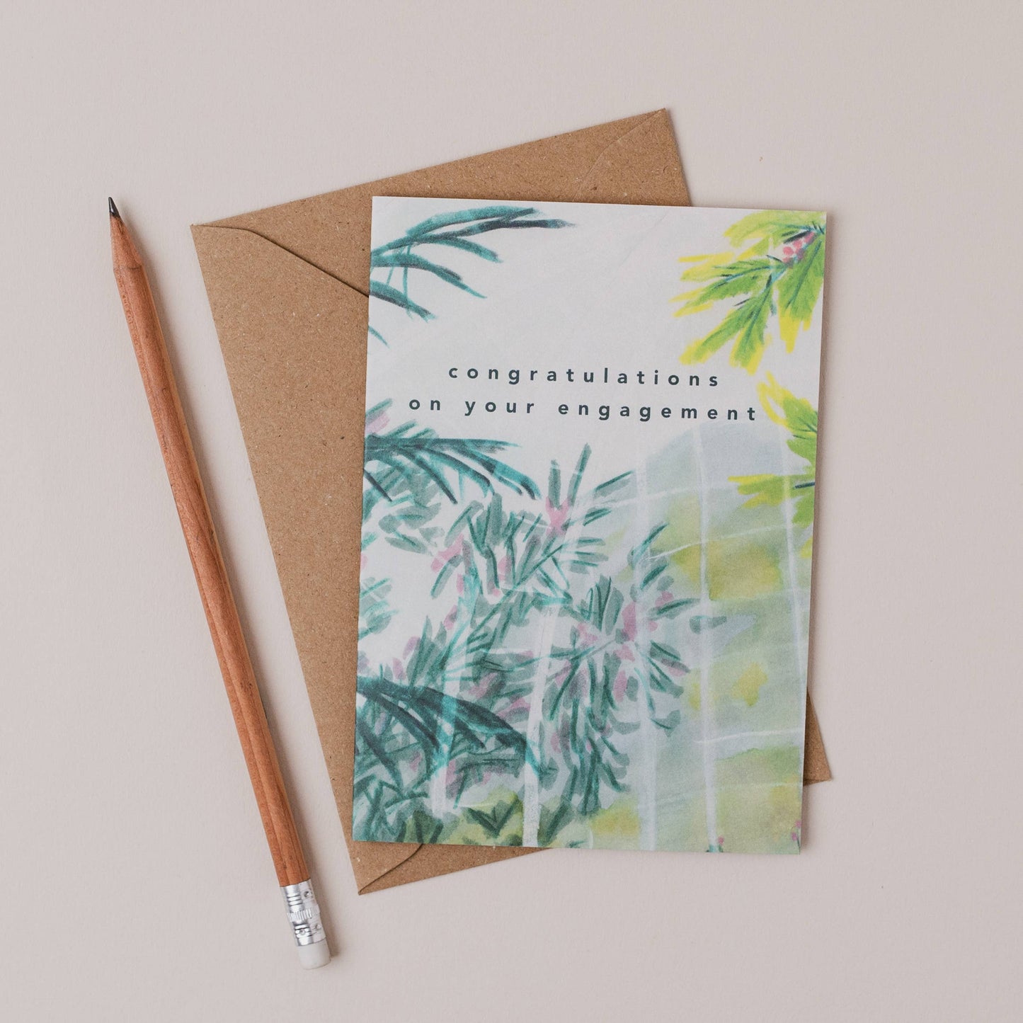 Luxury A6 engagement card with 'congratulations on your engagement' text and tropical palm house plants illustration, blank inside, printed on 350gsm UK card