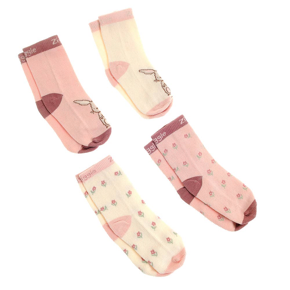 Set of four pairs of pink cotton baby socks with bunny design, anti-slip soles and ribbed cuffs
