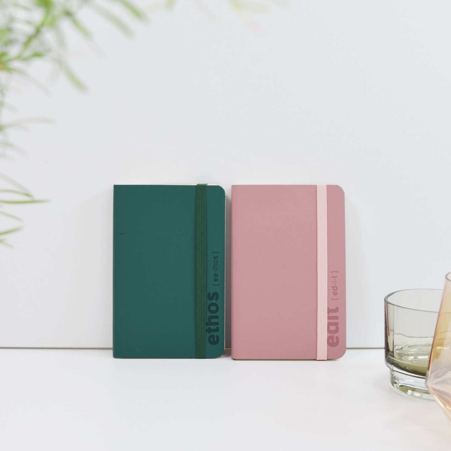 A6 recycled leather pocket notebook with elastic closure in green or pink