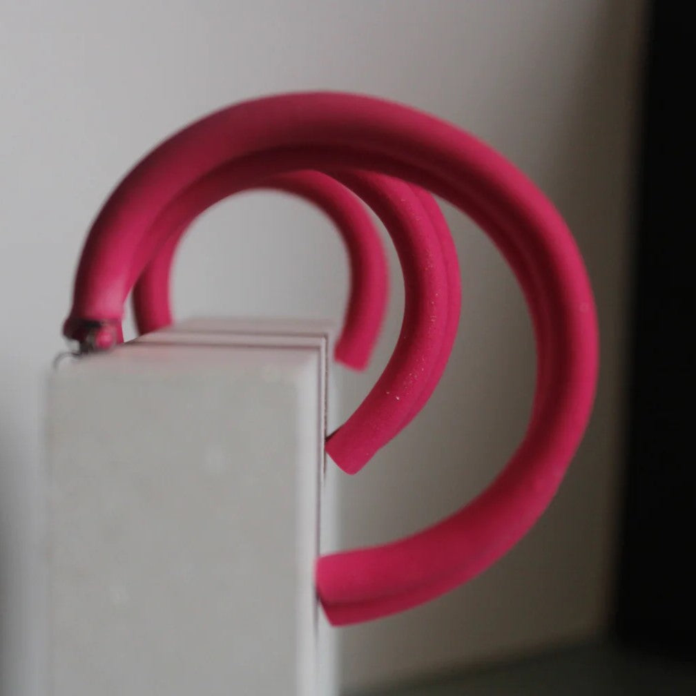 Handmade polymer clay hoop earrings with stainless steel fixtures, lightweight design, various size diameters, perfect for everyday wear.
