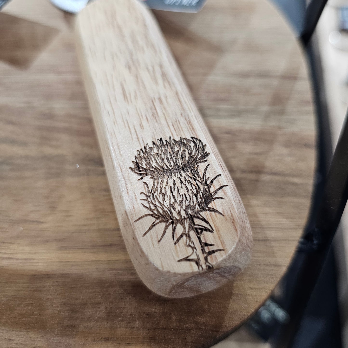 Scottish wooden bottle opener by Ardroy Creations with stainless steel hardware and Thistle design