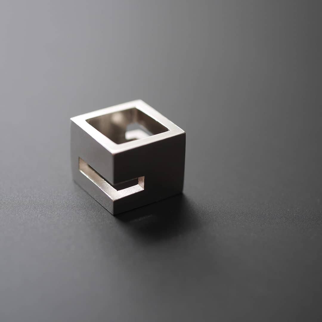CORNER CUT OUT CUBE PENDANT
