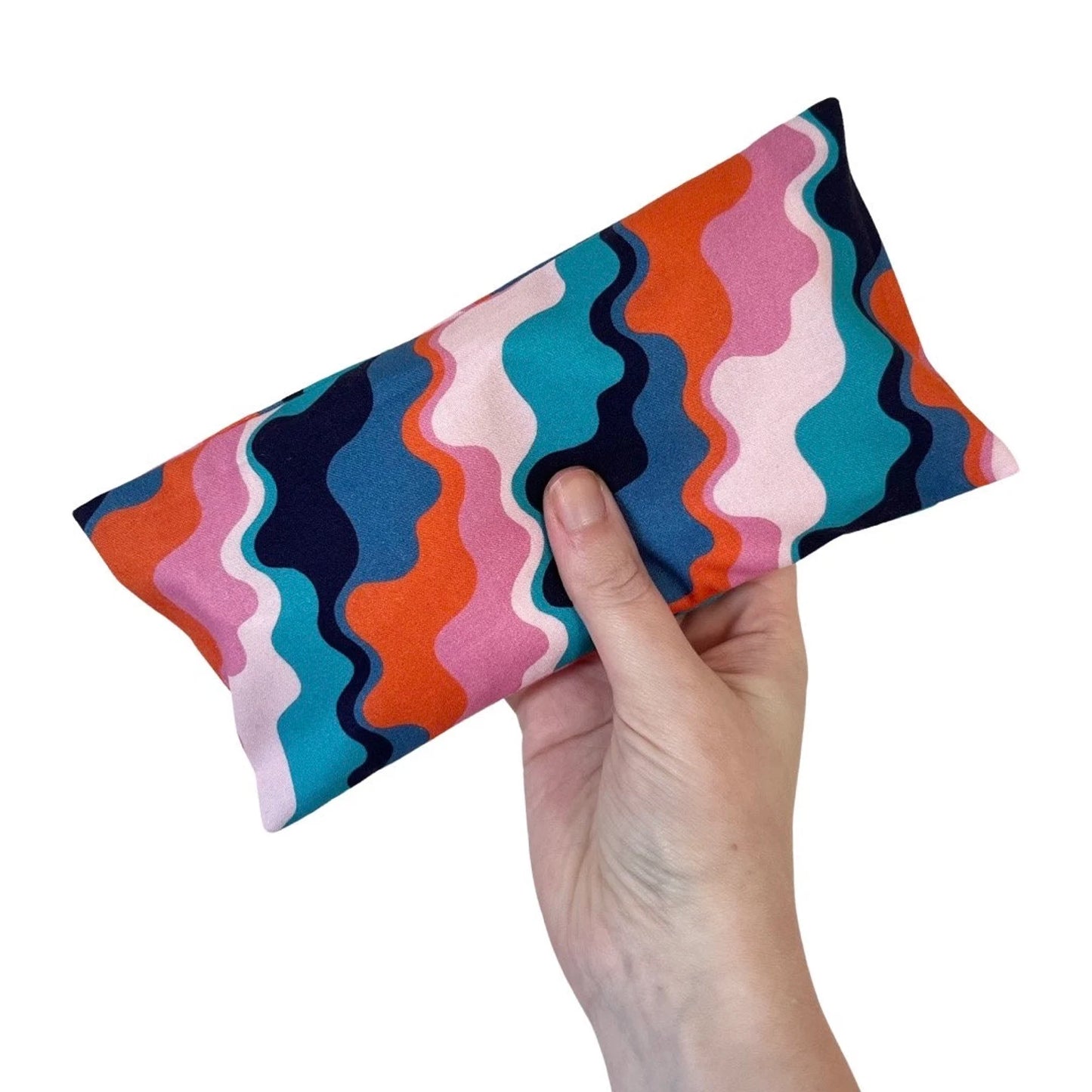 Handmade weighted lavender eye pillow with removable cotton cover, filled with organic flaxseed and dried lavender, perfect for relaxation