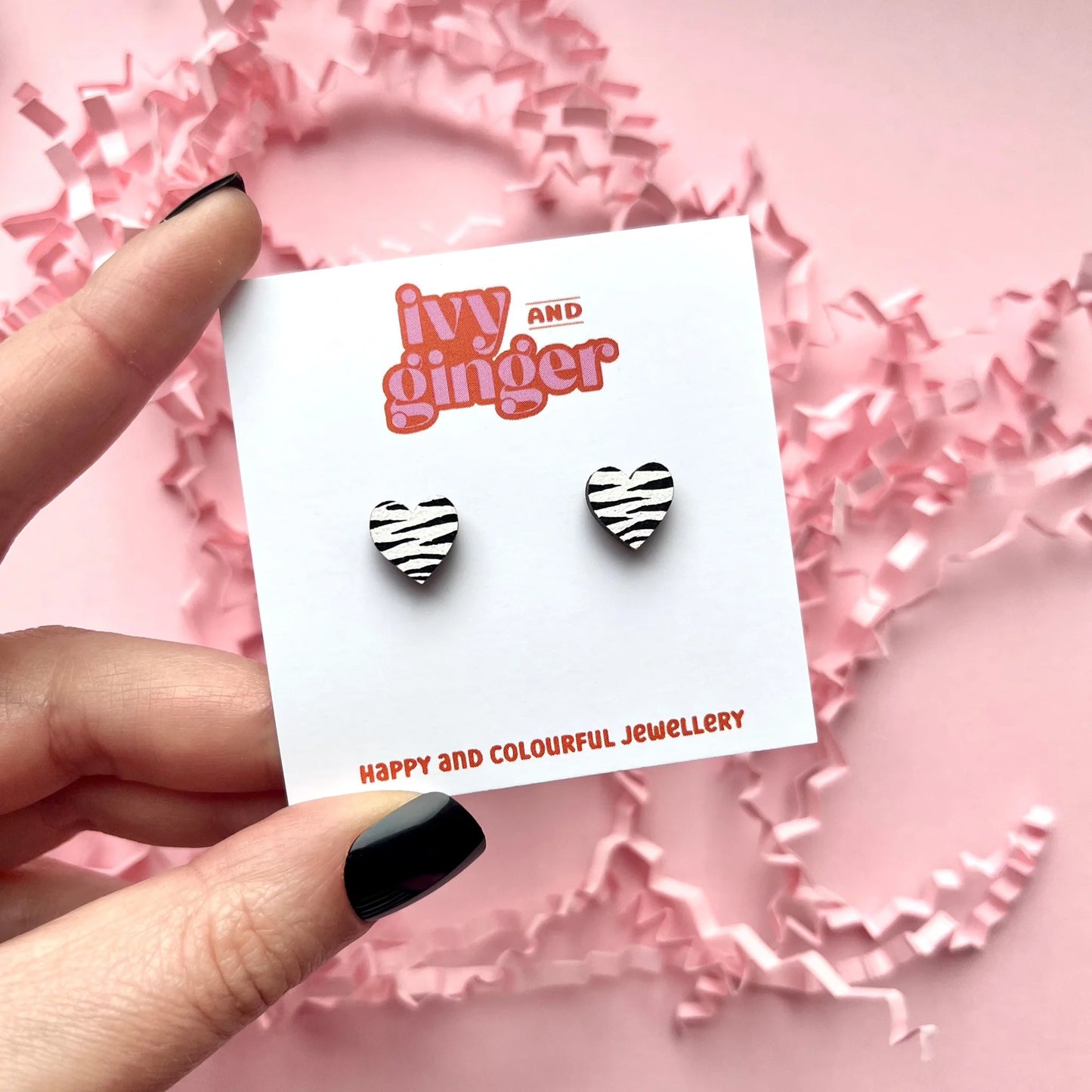 MINI ZEBRA PRINT HEART STUDS