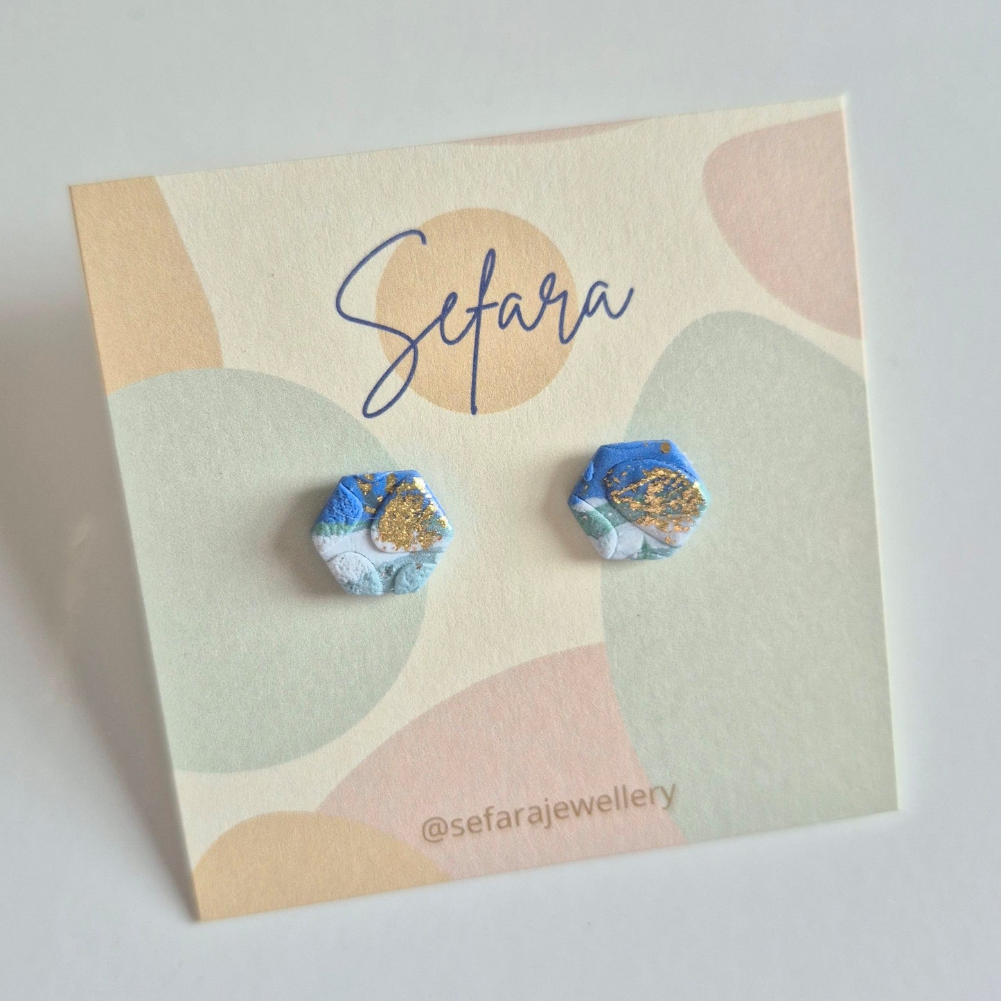 Sefara Jewellery hexagonal polymer clay stud earrings with gold leaf detail, handmade in Scotland