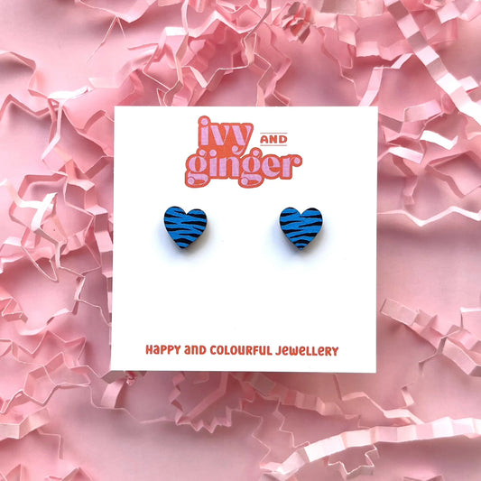 A pair of Ivy and Ginger blue and black zebra print mini heart-shaped studs