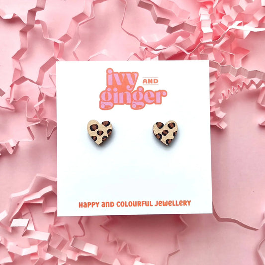 A pair of Ivy and Ginger brown and beige leopard print mini heart studs earrings