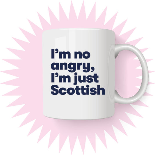 A white ceramic mug with a bold, funny text decal that reads 'I'm No Angry I'm Just Scottish' in a modern, wrap-around design.