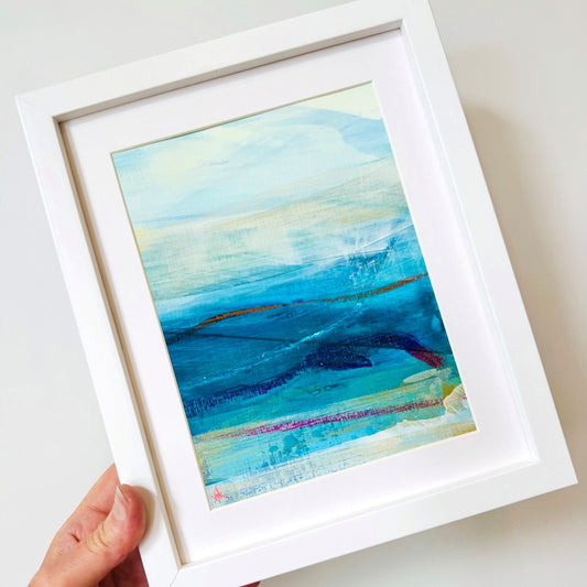 Original mixed media painting of Lunan Bay coastline, framed in white 9x11 inch frame.