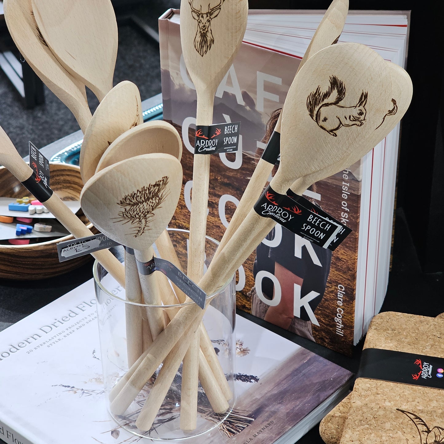 Scottish solid beech wooden spoons by Ardroy Creations with Highland Coo, Stag, Thistle, Puffin and Red Squirrel designs.