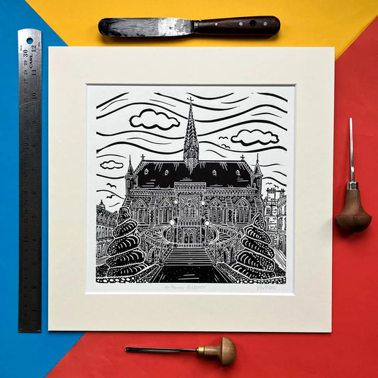 Square black-and-white linocut print of The McManus Art Gallery and Museum in Dundee by Pamela Scott, mounted in antique white.
