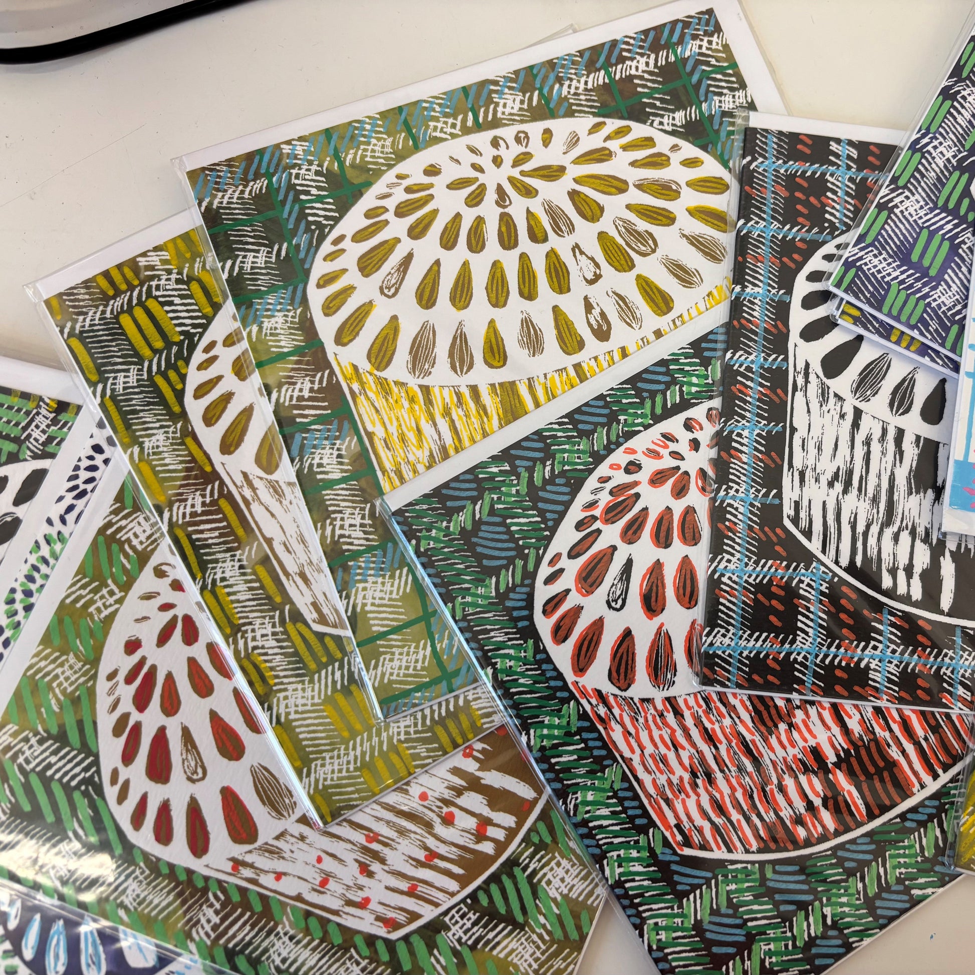 Monochrome Dundee Cake illustration card with colurful hand-finished details by Louise Kirby