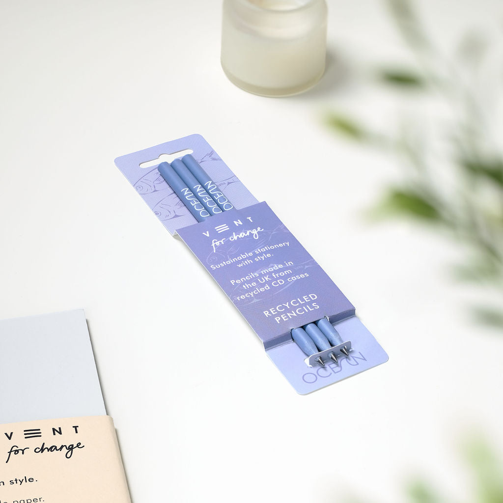 Pack of three OCEAN recycled graphite pencils in blue sleeve, made from CD cases with embossed design