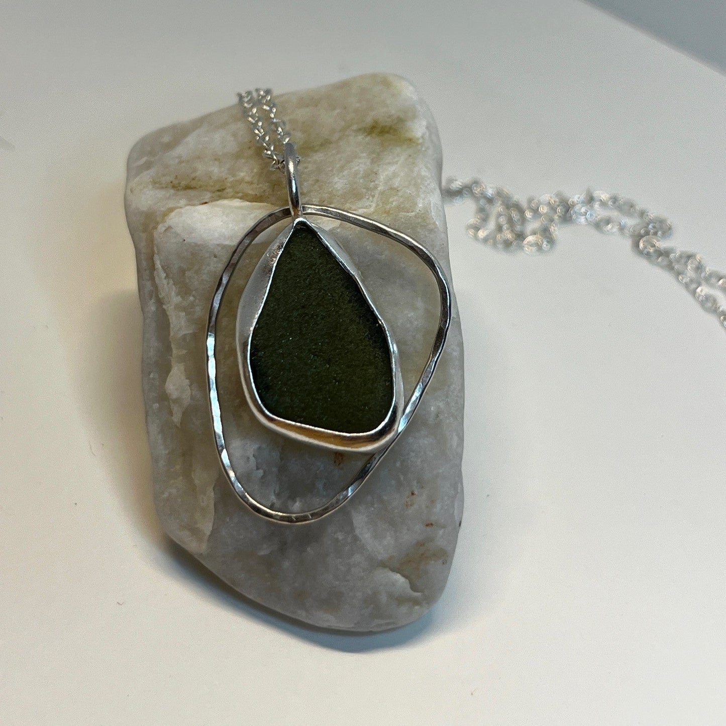 Sterling silver olive green sea glass pendant necklace handmade in Dundee with pebble shaped ring
