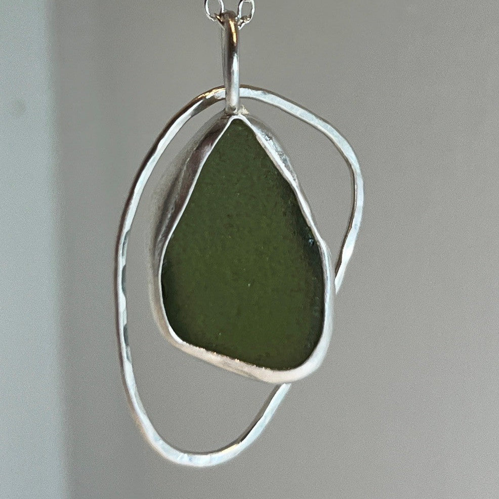 Sterling silver olive green sea glass pendant necklace handmade in Dundee with pebble shaped ring